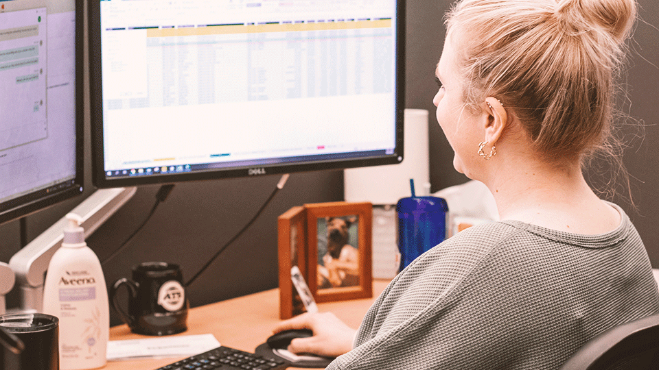 Corporate Recruiter Sitting at Desk